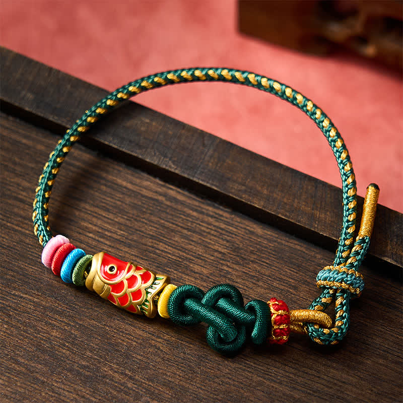 Buddha Stones Handgewebtes Armband aus dunkelgrün-gelbem Garn mit rotem Koi-Fisch-Schutzmotiv - image 1
