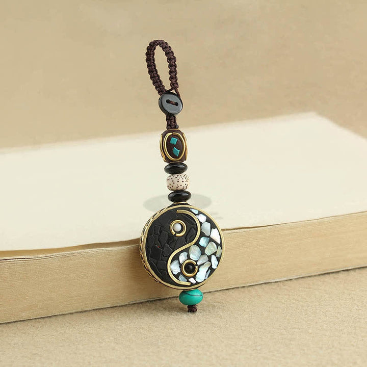 Buddha Stones Yin-Yang-Anhänger-Schlüsselanhänger aus Wengeholz - image 1