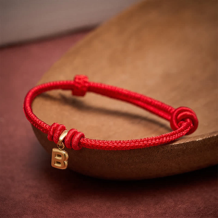 Buddha Stones Armband aus Titanstahl mit rotem Faden und Buchstaben - image 12