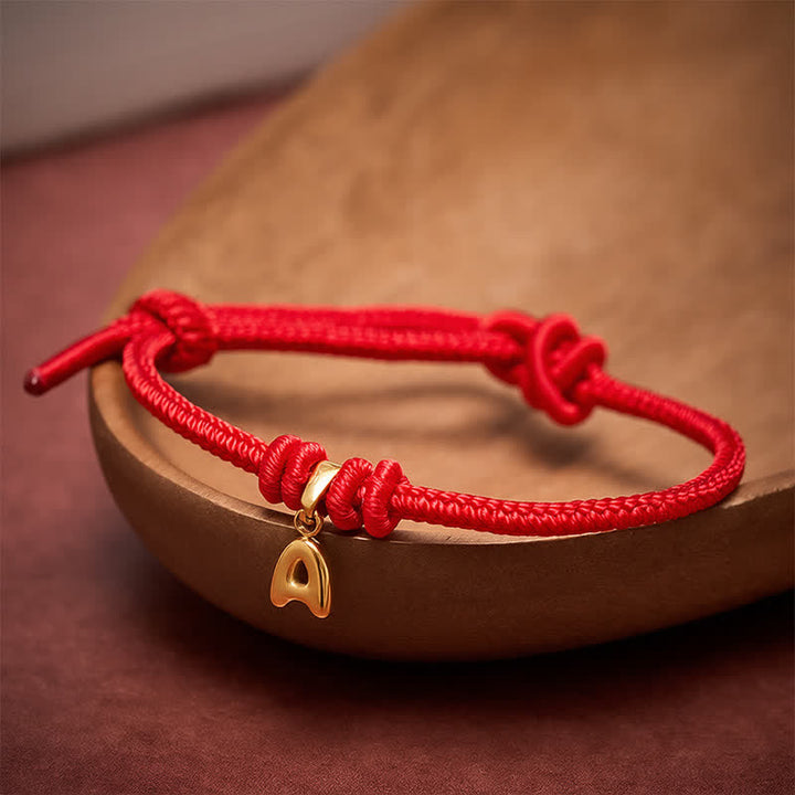 Buddha Stones Armband aus Titanstahl mit rotem Faden und Buchstaben - image 3