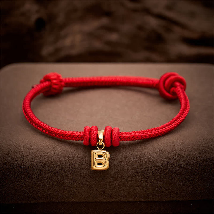 Buddha Stones Armband aus Titanstahl mit rotem Faden und Buchstaben - image 13