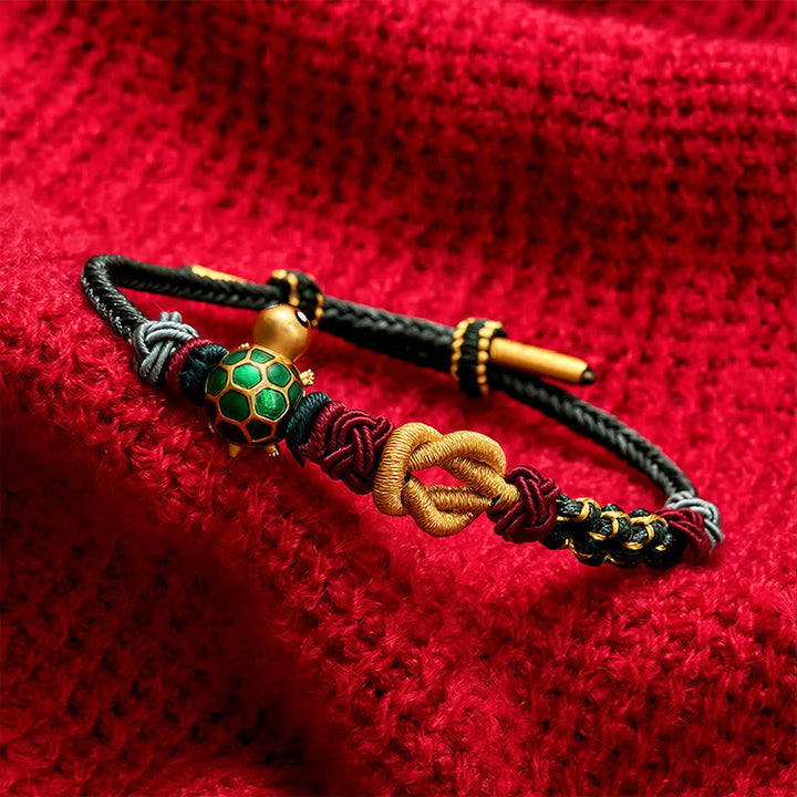 Buddha Stones Handgewebtes Schutzarmband aus Kupfer mit Schildkrötenmotiv und roter Schnur - image 3