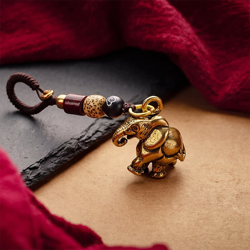 Buddha Stones Vintage Schlüsselanhänger mit Elefantenmotiv aus Messing und fünf Kaisermünzen als Glücksbringer - image 1