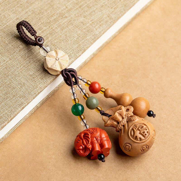 Buddha Stones Pfirsichholz-Fu-Figuren-Geldbeutel, Glücksbringer-Zinnober-Elefant, Lotuskürbis-Schlüsselanhänger - Pfirsichholz (Schutz ♥ Reinigung) - image 0