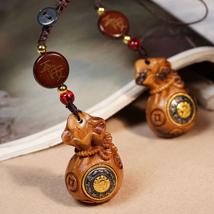 Buddha Stones Geldbeutel aus vom Blitz getroffenem Jujube-Holz, chinesische Münzschutz- und Reichtums-Schlüsselanhänger - image 0