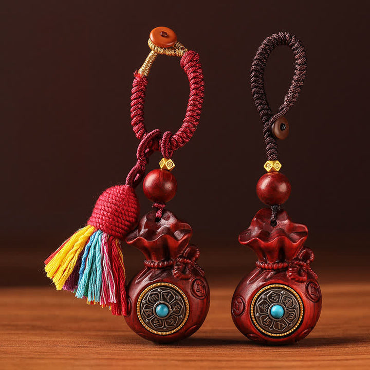 Buddha Stones Geldbeutel aus rotem Sandelholz, Schlüsselanhänger mit Om Mani Padme Hum und Weisheitssymbolen - image 11