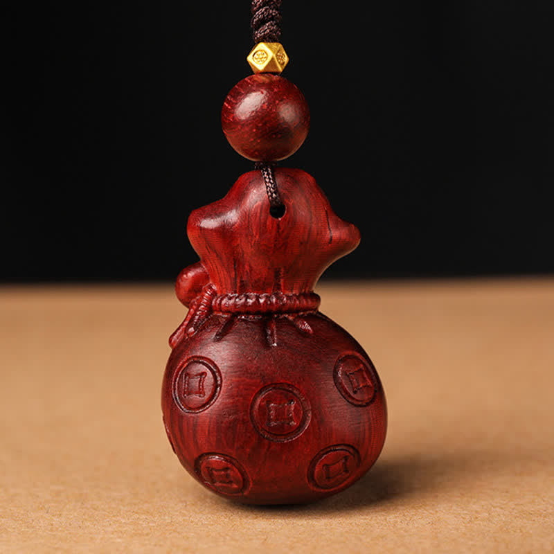 Buddha Stones Geldbeutel aus rotem Sandelholz, Schlüsselanhänger mit Om Mani Padme Hum und Weisheitssymbolen - image 3