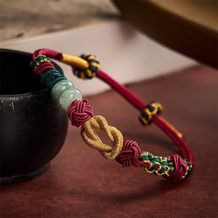 Buddha Stones Handgewebtes Armband aus Pfirsichblüten, Glücksjadeperlen und roter Schnur - image 1