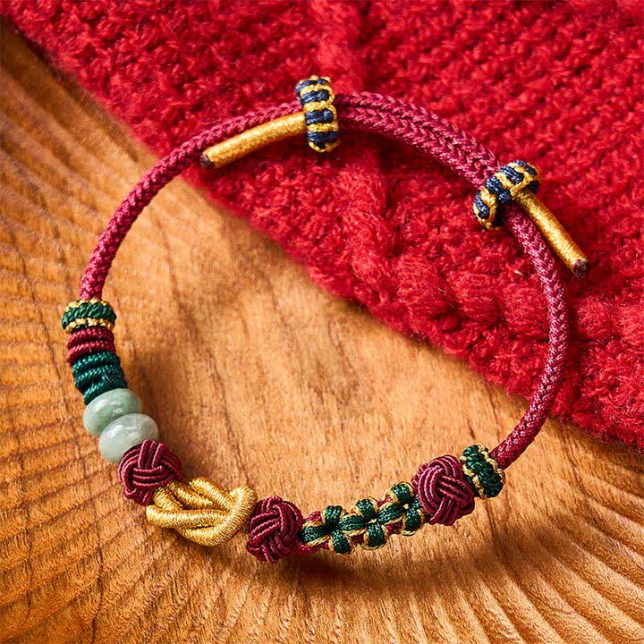 Buddha Stones Handgewebtes Armband aus Pfirsichblüten, Glücksjadeperlen und roter Schnur - Rot (Handgelenkumfang: 15-18 cm) - image 0