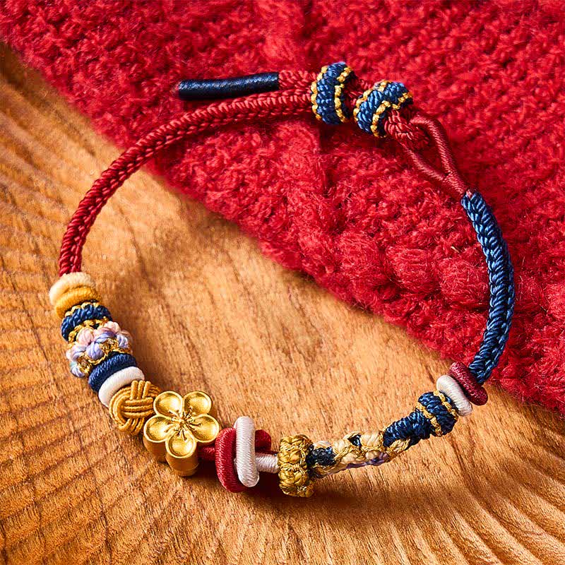 Buddha Stones Handgewebtes Armband aus rotem und marineblauem Garn mit Pfirsichblütenmuster - image 1