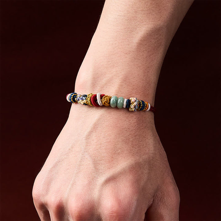 Buddha Stones Handgewebtes Armband aus pfirsichblütenförmigen Glücksjadeperlen in Rot und Marineblau - image 5