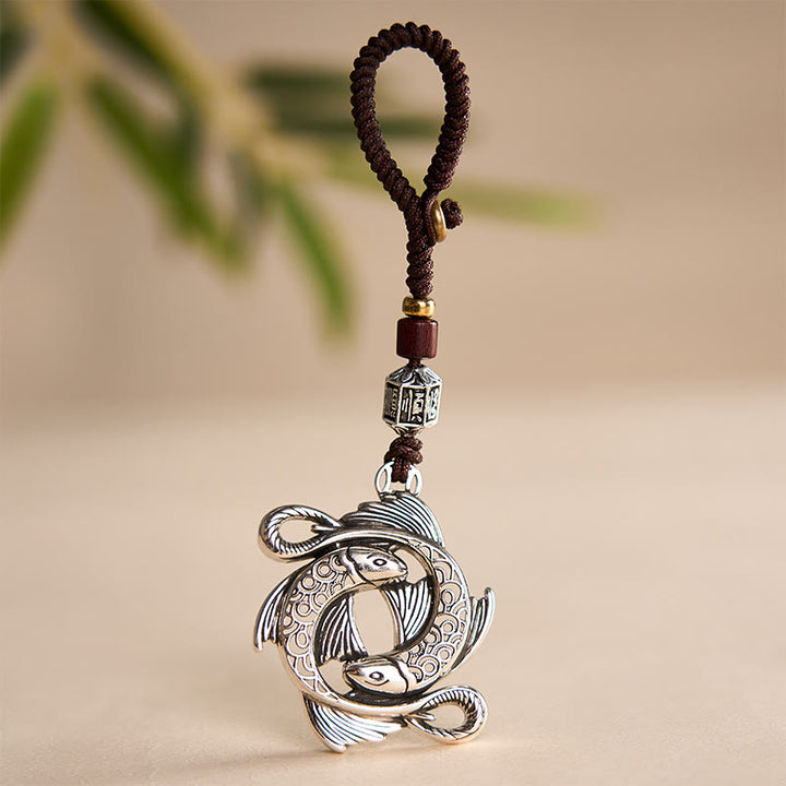 Buddha Stones Vintage-Schlüsselanhänger aus Kupfer mit Doppel-Koi-Fisch-Motiv und Symbol der Entschlossenheit - image 3