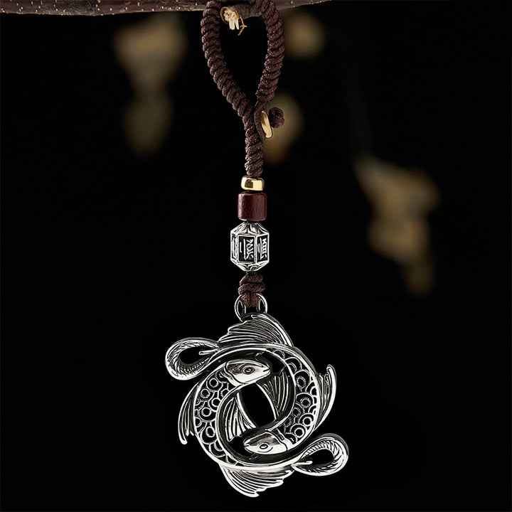 Buddha Stones Vintage-Schlüsselanhänger aus Kupfer mit Doppel-Koi-Fisch-Motiv und Symbol der Entschlossenheit - image 1