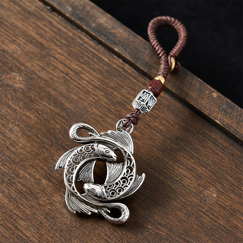 Buddha Stones Vintage-Schlüsselanhänger aus Kupfer mit Doppel-Koi-Fisch-Motiv und Symbol der Entschlossenheit - image 2