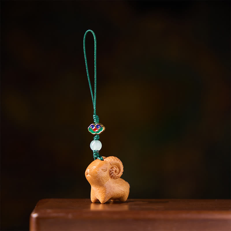 Buddha Stones Handgeschnitzte Schlüsselanhänger aus Sandelholz mit Ziegenmotiv - image 8