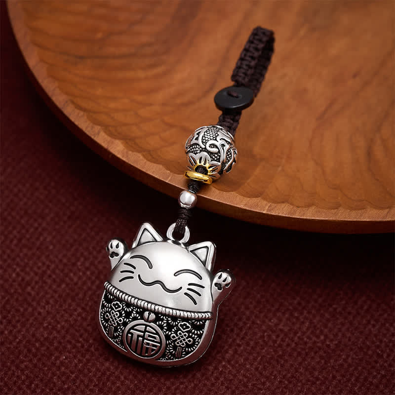 Buddha Stones Schlüsselanhänger aus graviertem Kupfer mit Fu-Figur, Glückskatze und geflochtenem Gleichgewichtsanhänger - Silberne Glückskatze - image 0