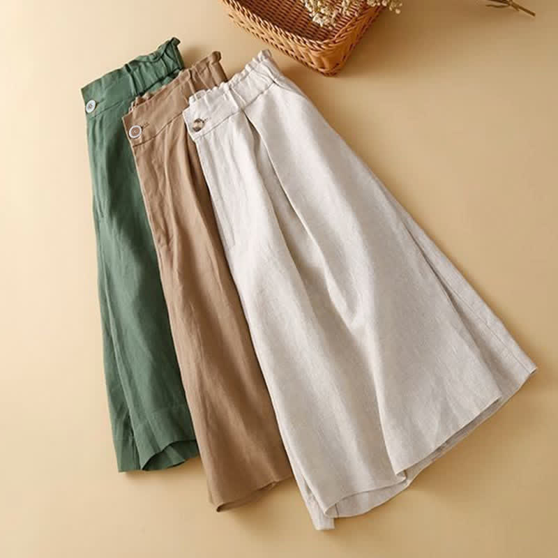 Buddha Stones - Unifarbene, plissierte Shorts aus Baumwollleinen mit Reißverschluss und Taschen - image 1
