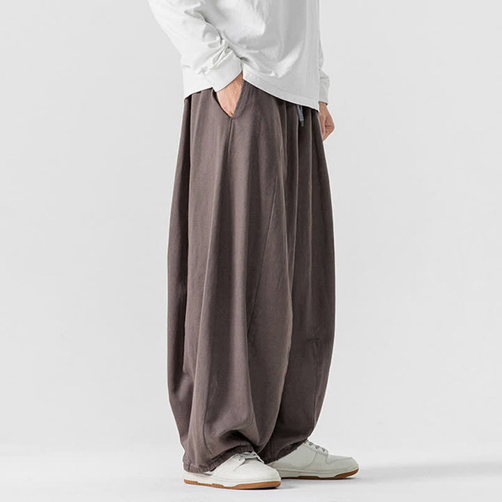 Buddha Stones Lässige, schlichte lange Herrenhose aus einfarbigem Baumwollstoff mit Kordelzug und Taschen - image 2