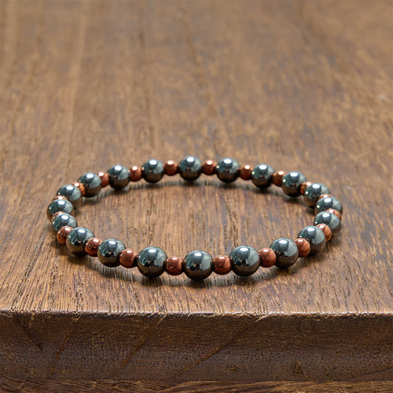 Buddha Stones 2-teiliges Set: Minimalistisches Armband aus runden Hämatitperlen für mehr Erdung - image 8
