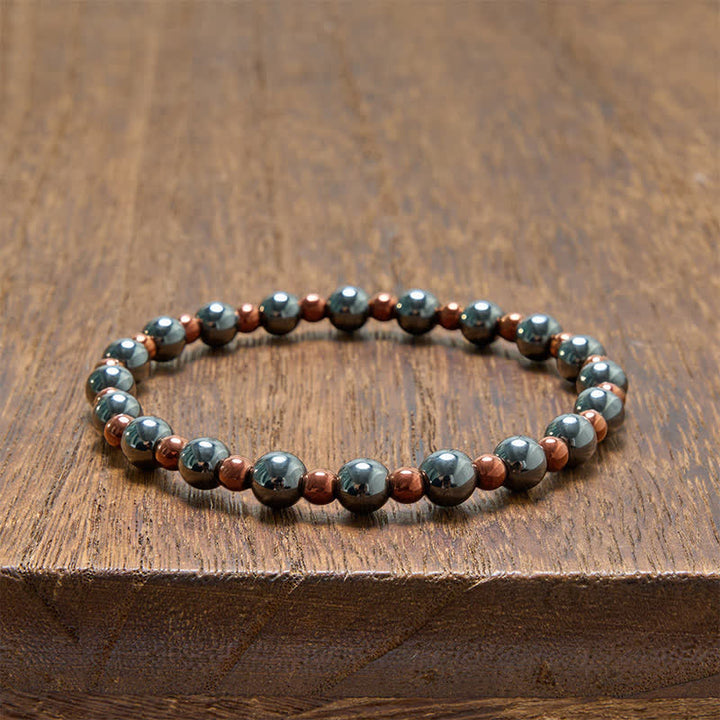 Buddha Stones 2-teiliges Set: Minimalistisches Armband aus runden Hämatitperlen für mehr Erdung - image 8