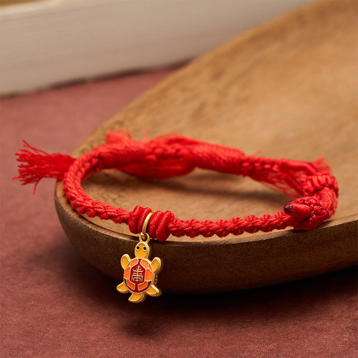Buddha Stones Schildkrötenanhänger, vergoldetes Kupfer-Rotfaden-Armband aus Tibet - image 1
