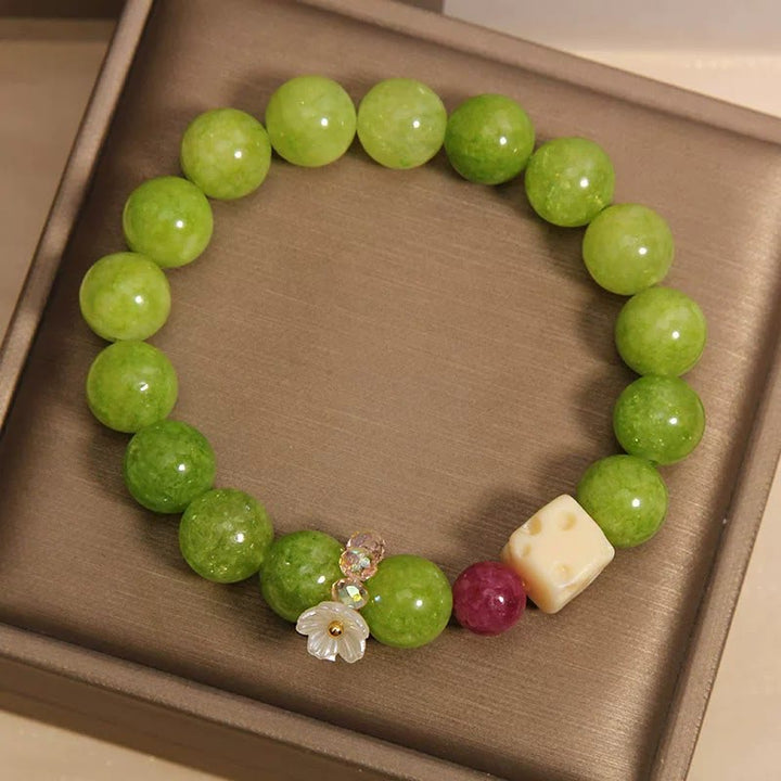 Buddha Stones Heilendes Perlenarmband mit Peridot-Blumenanhänger - image 4
