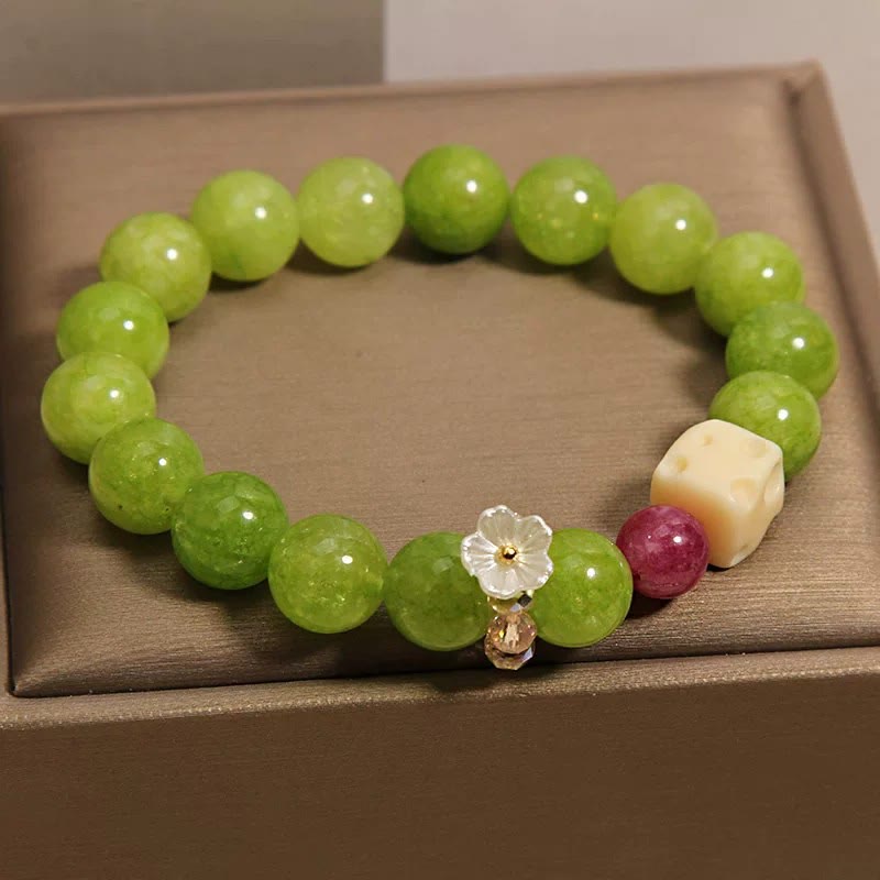 Buddha Stones Heilendes Perlenarmband mit Peridot-Blumenanhänger - image 1