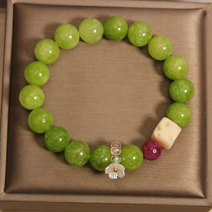 Buddha Stones Heilendes Perlenarmband mit Peridot-Blumenanhänger - image 2