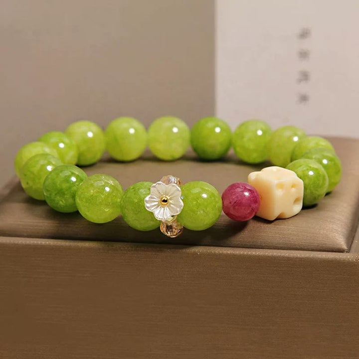 Buddha Stones Heilendes Perlenarmband mit Peridot-Blumenanhänger - image 8