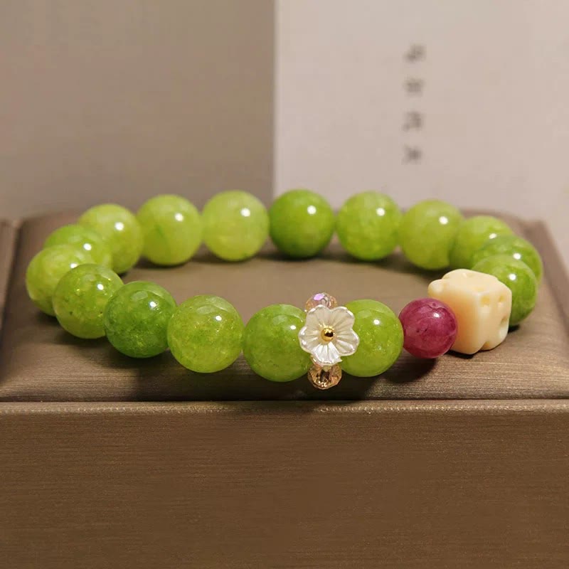 Buddha Stones Heilendes Perlenarmband mit Peridot-Blumenanhänger - image 7