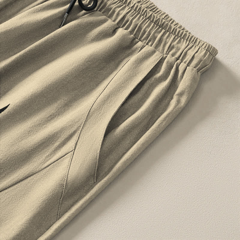 Buddha Stones Herrenhose aus reiner Baumwolle mit Tribal-Sonnenmuster, Kordelzug, schmal zulaufendem Schnitt und Taschen - image 4
