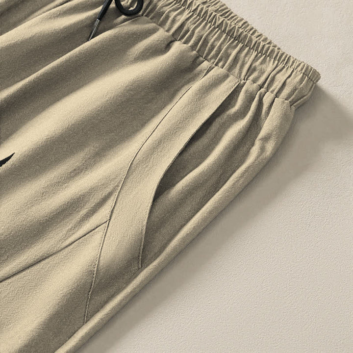 Buddha Stones Herrenhose aus reiner Baumwolle mit Tribal-Sonnenmuster, Kordelzug, schmal zulaufendem Schnitt und Taschen - image 4