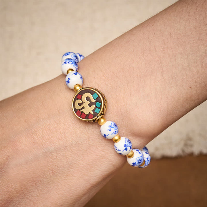 Buddha Stones Armband aus blau-weißem Porzellan und Kupfer mit OM-Gliedern der Bar. - image 3