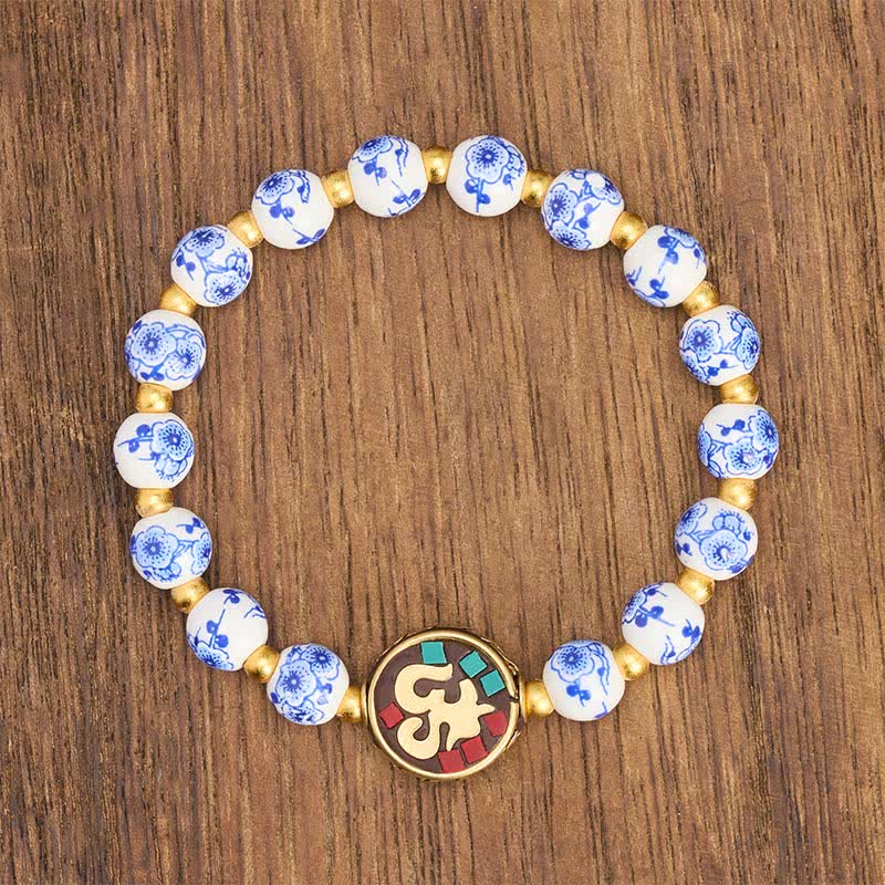 Buddha Stones Armband aus blau-weißem Porzellan und Kupfer mit OM-Gliedern der Bar. - image 2