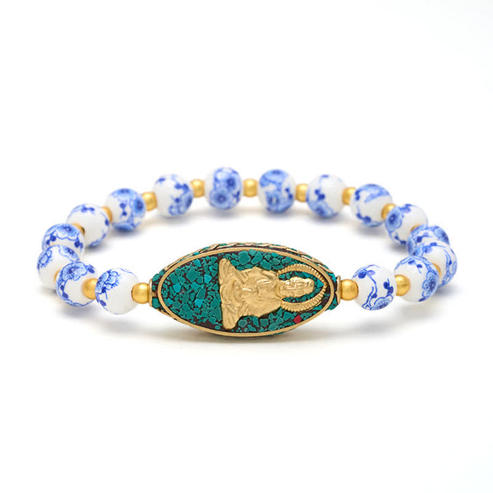 Buddha Stones Armband mit Buddha-Motiv aus weißem Porzellan, blauen floralen Perlen und runden Perlen - image 4