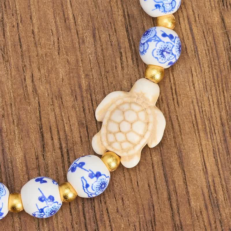 Buddha Stones Armband aus blau-weißem Porzellan mit Schildkrötenmotiv – Symbol für Reinheit und Langlebigkeit - image 9