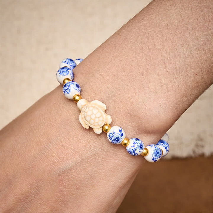 Buddha Stones Armband aus blau-weißem Porzellan mit Schildkrötenmotiv – Symbol für Reinheit und Langlebigkeit - image 4