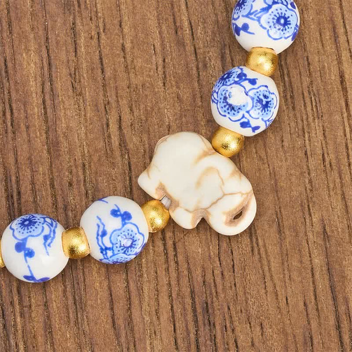 Buddha Stones Armband aus weißem Porzellan mit Elefanten- und Blumenmuster, runden Perlen - image 8
