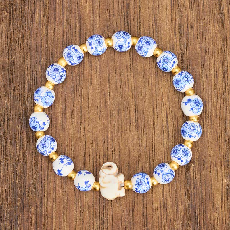 Buddha Stones Armband aus weißem Porzellan mit Elefanten- und Blumenmuster, runden Perlen - image 1
