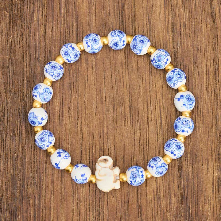 Buddha Stones Armband aus weißem Porzellan mit Elefanten- und Blumenmuster, runden Perlen - image 1
