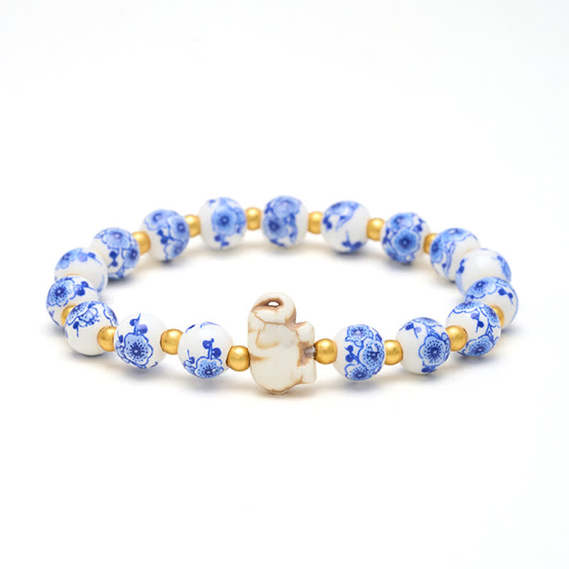 Buddha Stones Armband aus weißem Porzellan mit Elefanten- und Blumenmuster, runden Perlen - Elefant (STÄRKE ♥ WEISHEIT) - image 0