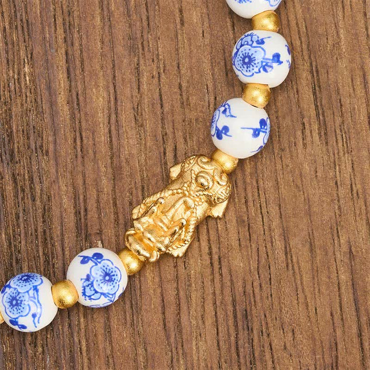 Buddha Stones Weißes Porzellan-PiXiu-Armband mit blauen Blumenperlen (Glücksbringer) - image 4