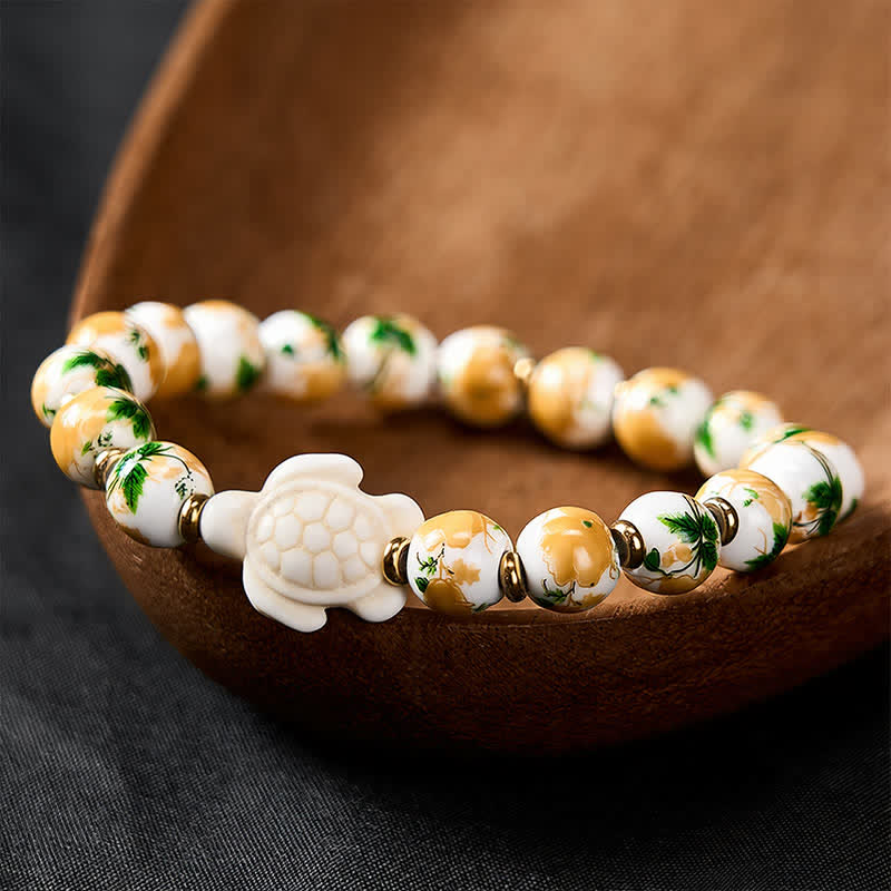 Buddha Stones Natürliches weißes Türkis-Armband mit Schildkrötenmotiv - Weißes Porzellan (Handgelenkumfang: 16–17 cm) - image 0