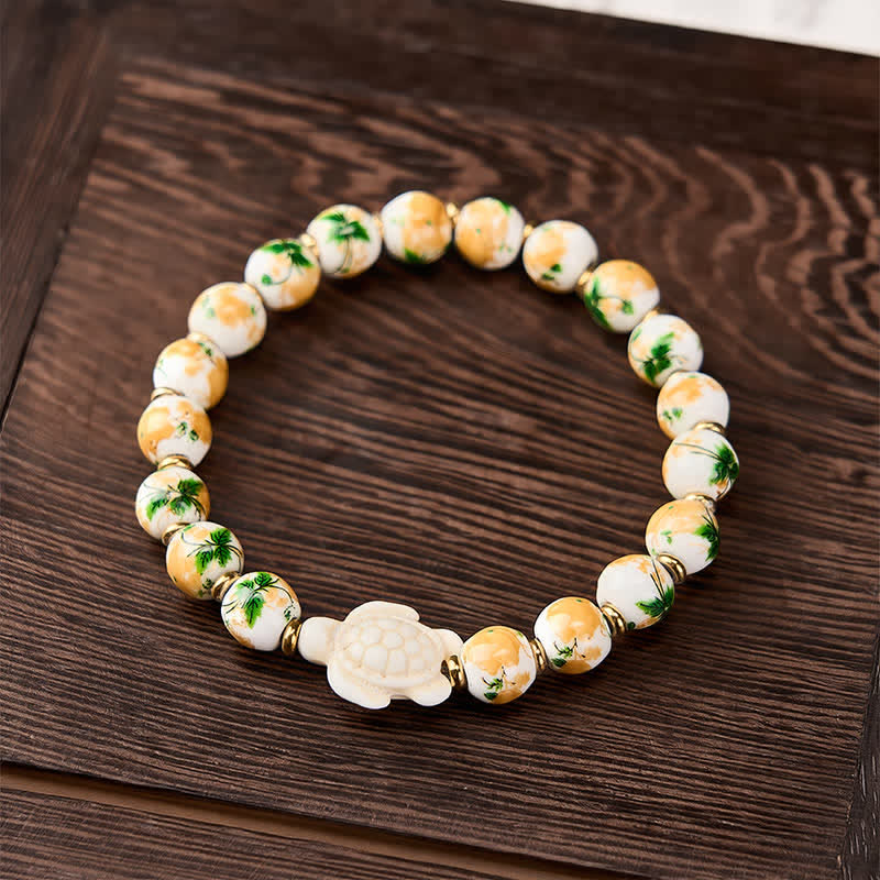 Buddha Stones Natürliches weißes Türkis-Armband mit Schildkrötenmotiv - image 1