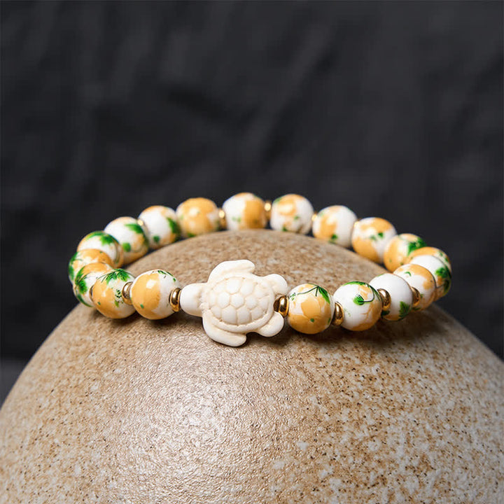 Buddha Stones Natürliches weißes Türkis-Armband mit Schildkrötenmotiv - image 3