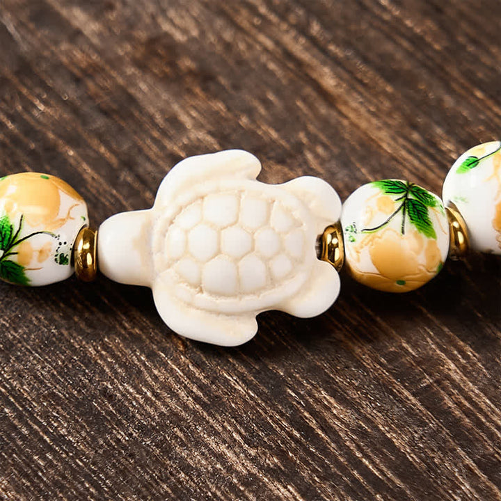 Buddha Stones Natürliches weißes Türkis-Armband mit Schildkrötenmotiv - image 10