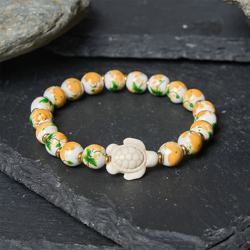 Buddha Stones Natürliches weißes Türkis-Armband mit Schildkrötenmotiv - image 2