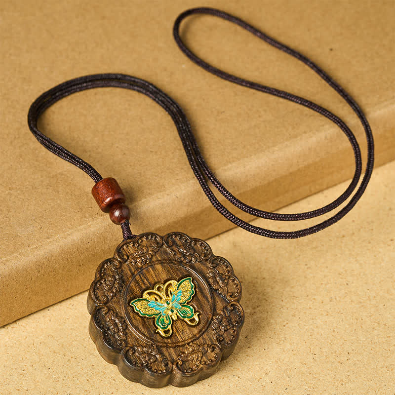 Buddha Stones Halskette mit Schmetterlingsanhänger aus geschnitztem Sappanholz - image 1