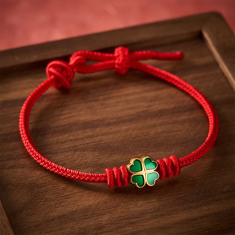 Buddha Stones Handgewebtes rotes Seilarmband mit herzförmigem grünem vierblättrigem Kleeblatt – Glücksarmband - image 1