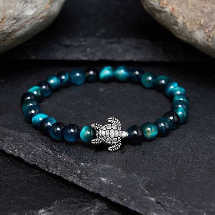 Buddha Stones Kraftvolles Armband aus blauem Tigerauge-Kupfer mit Schildkrötenmotiv - 6 mm blauer Tigerauge (Handgelenkumfang: 14–15 cm) - image 0